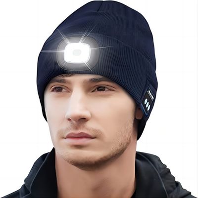 O Natal dos adolescentes das mulheres dos homens apresenta o chapéu dos fones de ouvido de Bluetooth com Headtorch