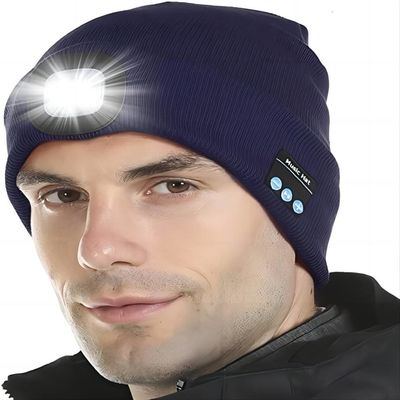 O Natal dos adolescentes das mulheres dos homens apresenta o chapéu dos fones de ouvido de Bluetooth com Headtorch