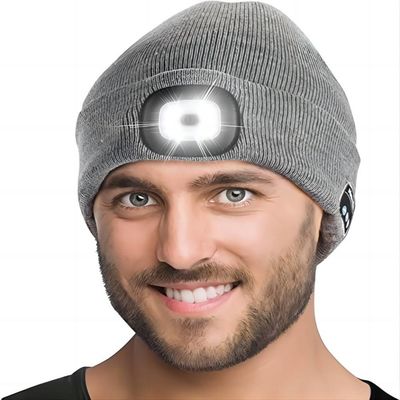 O chapéu dos fones de ouvido de Bluetooth dos esportes entrega livre com negociações Flahslight do telefone da música